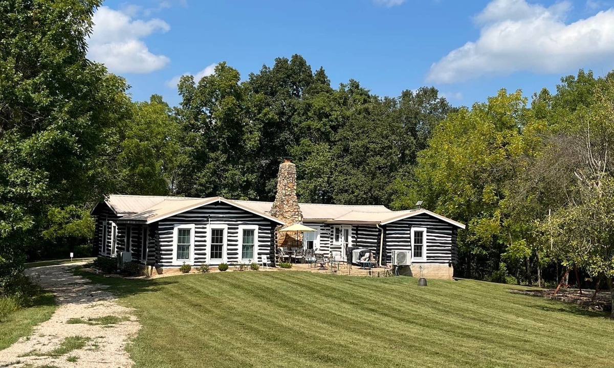 Steelville Cabin | Make a SPLASH at Patten's Landing, an 84-year old log cabin!