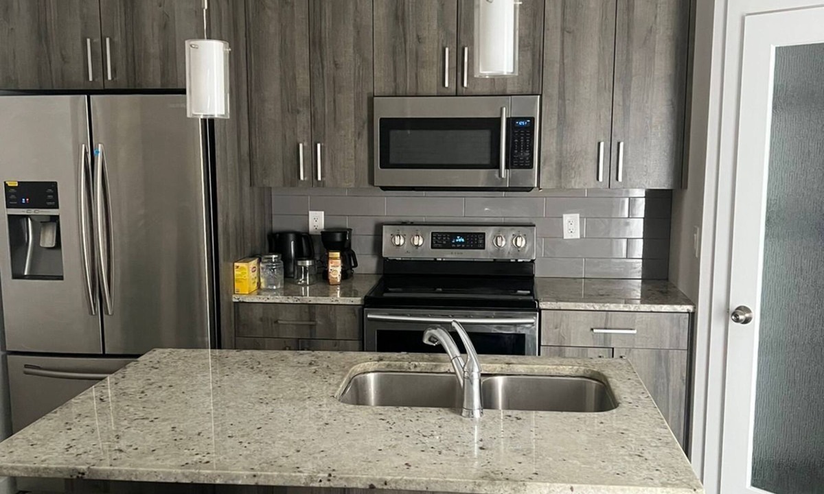 Winnipeg House | Master Bedroom with a private bath in a 3BD duplex