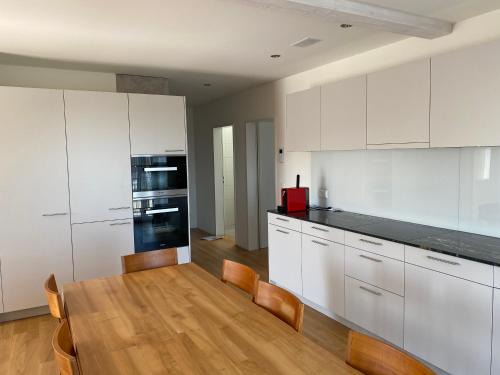 Rickenbach Apartment | Minergie mit gratis Tiefgaragenplatz