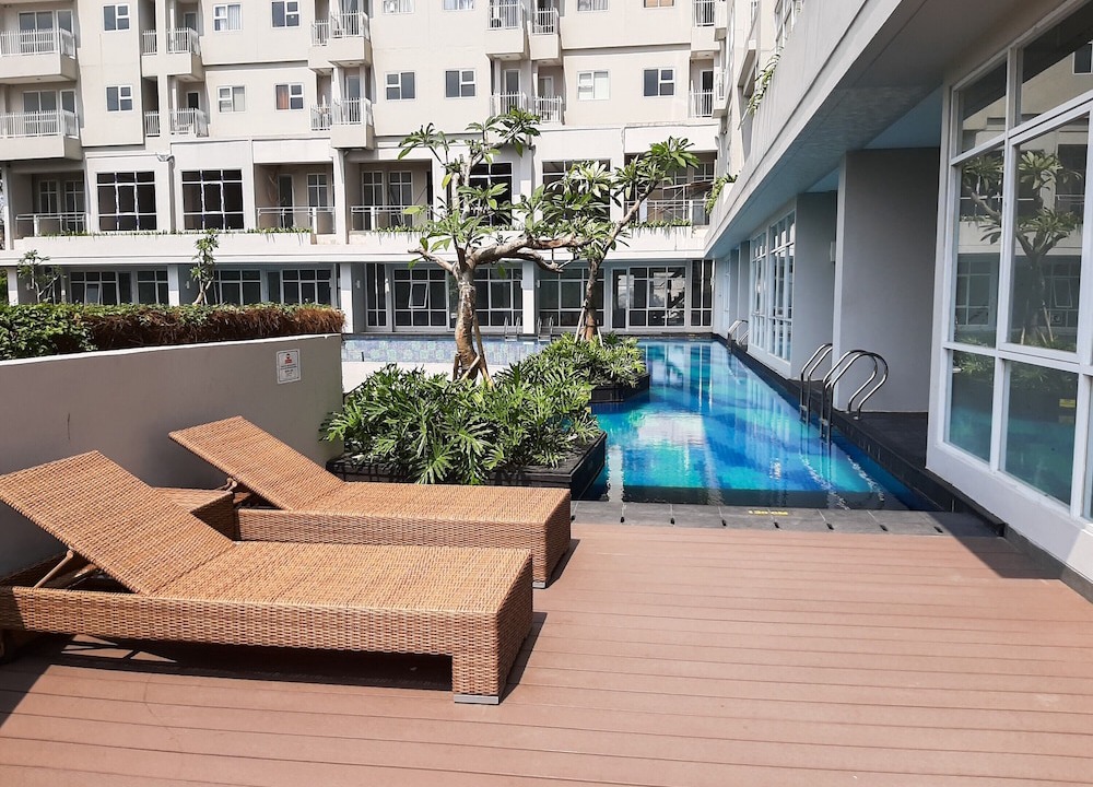 Pondok Aren Hotel | Minimalist Design Studio Apartment at Bintaro Icon