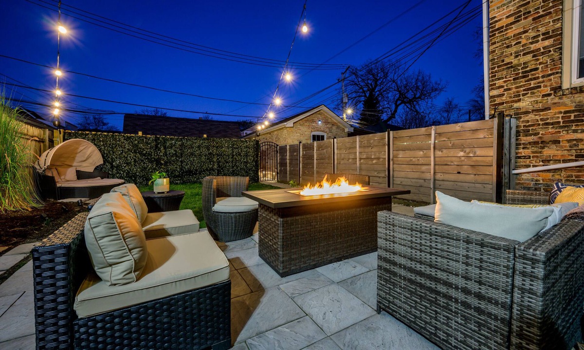 Logan Square Apartment | Modern 3-Bed Stay w/Patio, Firepit, & Garage Parking Spot