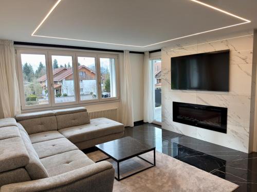 Heimberg Apartment | Modern 3BR Apartment with Fireplace, Miele Kitchen and Balcony