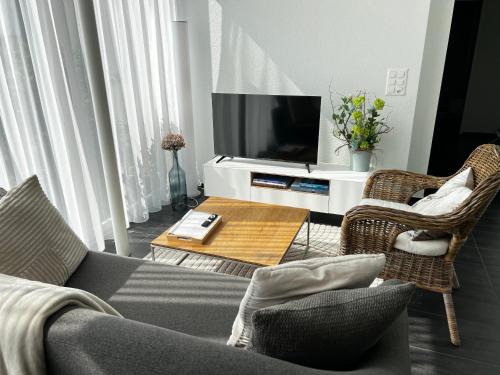 Stans Apartment | Modern apartment Pilatus view self check-in
