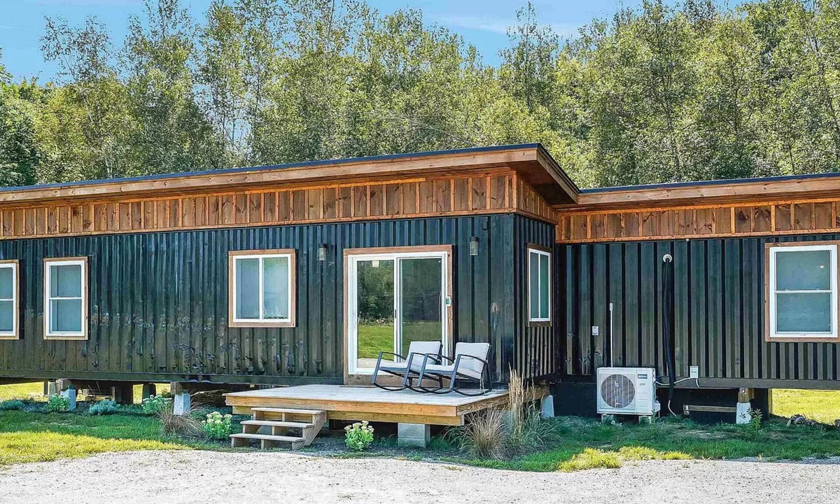 Rumney Cabin | Modern Container House with mountains, river, and privacy.