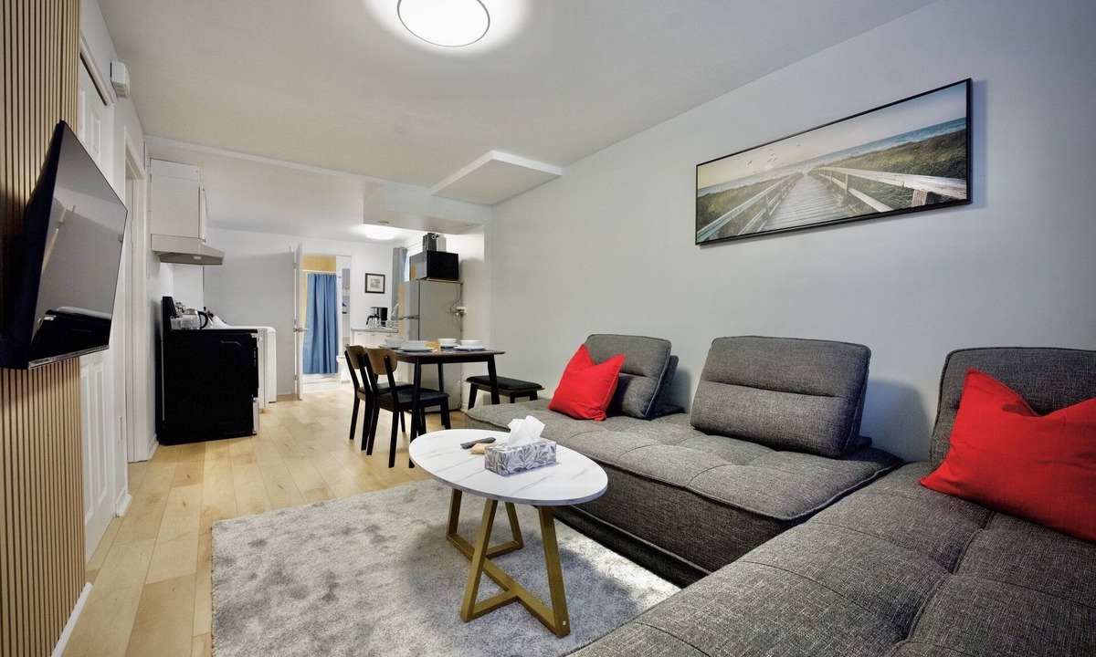 Laval-des-Rapides Apartment | Modern, cozy, 5 min walk to Metro, Place Bell, Free Parking
