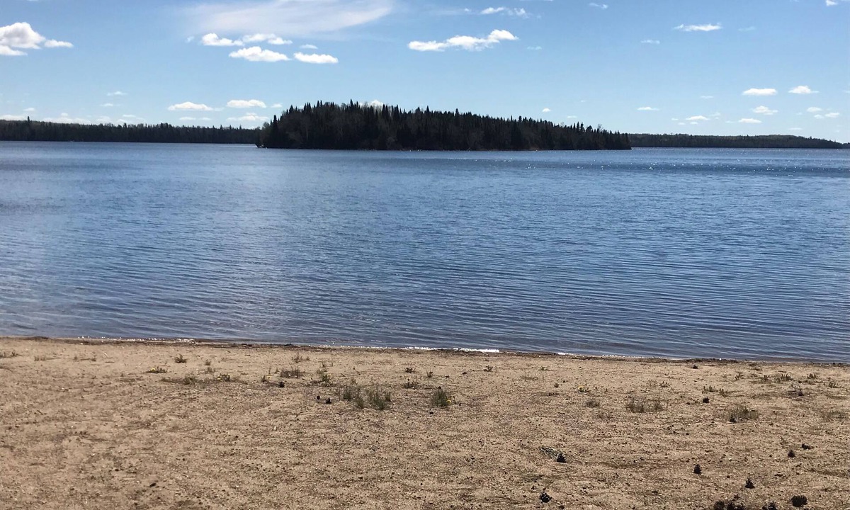 Shebandowan Cottage | Modern cozy cottage with beautiful sandy beach on the lake.