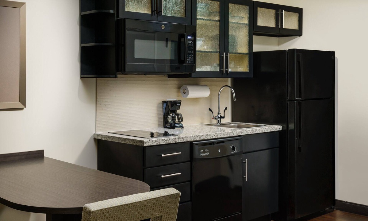 Florida Central Atlantic Coast Hotel | Modern Double Queen Studio | Kitchen & Grill | 3 mi to Typhoon Lagoon