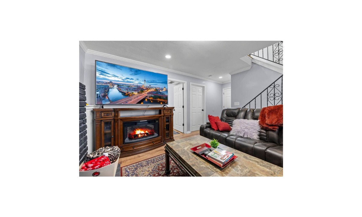 Olathe Apartment | Modern Family Gateway 2-connected duplexes by YDSH GuestMind! Guests enjoy full private access, easy self check in, and dedicated parking.