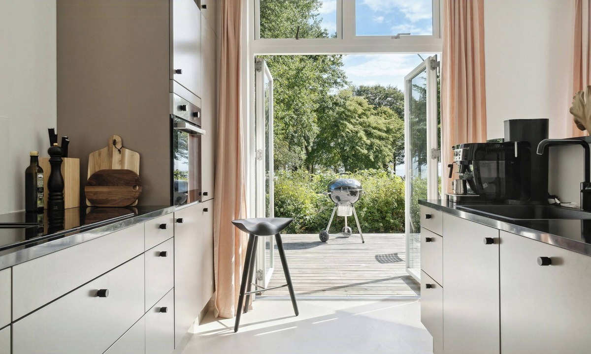 Nysted House | Modern family home by the sea with activities