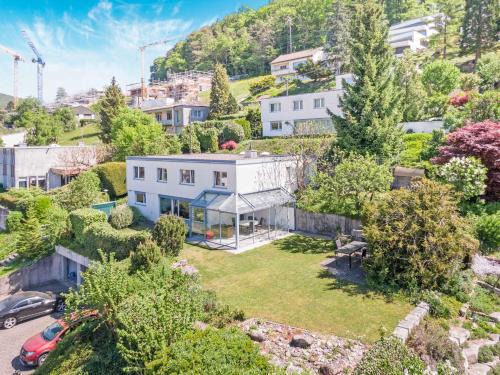 Erlinsbach House | Modern Living Villa mit Panorama-Wintergarten & TV