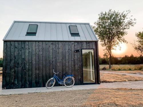 Allen County House | Modern Loft Cabin with Skylights, Paddle Boards & Trail Access in Humboldt, Kansas