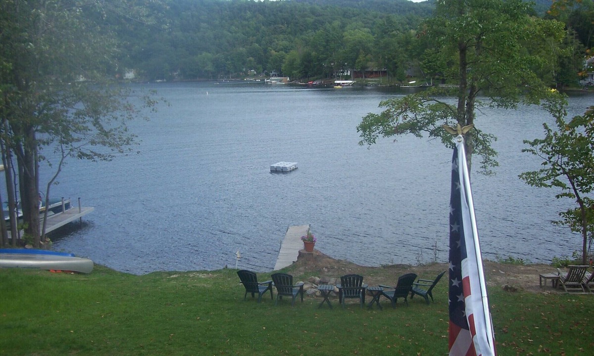 Wells Ski Chalet | Modern Log Home with 70 feet of lakefront! Great Fishing and Swimming!