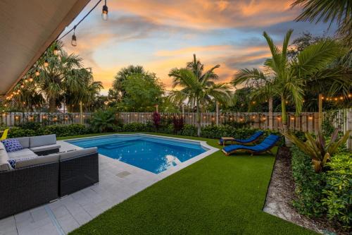 Poiciana Park II House | Modern Romantic Tropical Poolside Retreat!