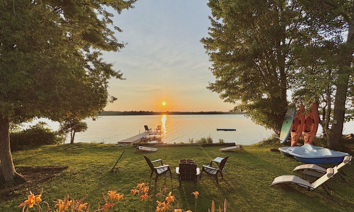 Stone Mills Cottage | Modern, Sunset-Facing Waterfront Cottage