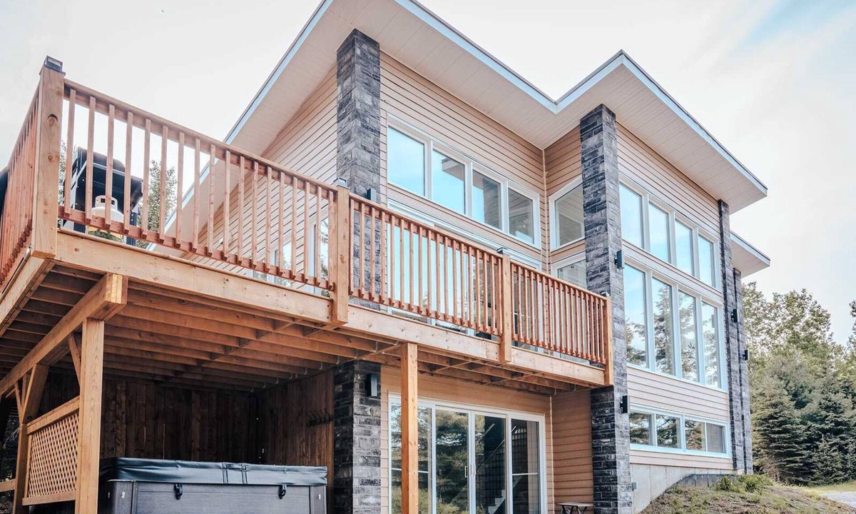 Riviere-Rouge Ski Chalet | Modern Waterfront Cottage on the Rouge River & Spa