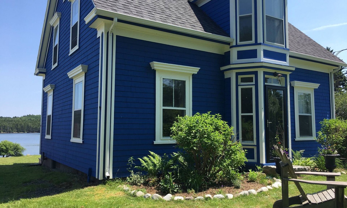 Lunenburg County House | Modernized waterfront heritage homestead with entertainment barn