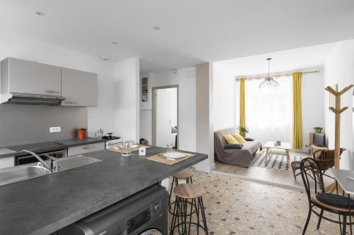 Salorges - Sainte-Anne Apartment | Mosaik by Cocoonr