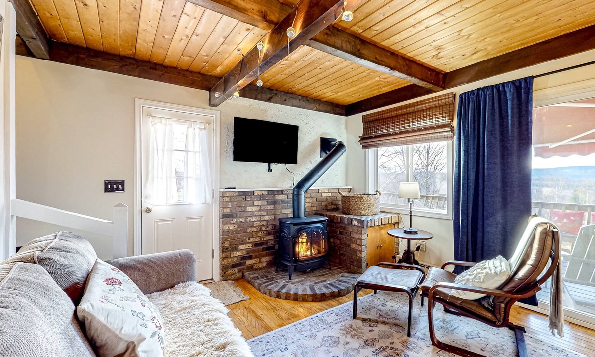 Whitefield House | Mountain-view cottage with inviting deck, fireplace & washer/dryer