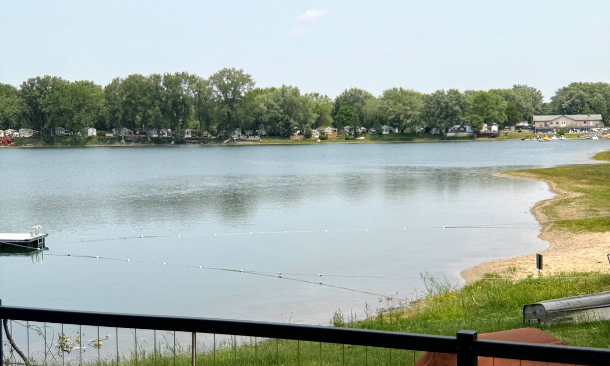 Portage RV Rental | MTM Premier - The Funky Duo combines Funky Island and Funky Jungle—two side-by-side lakefront properties sleeping 12 total. A bright park model and cozy log cabin with shared campground amenities, perfect for larger groups.