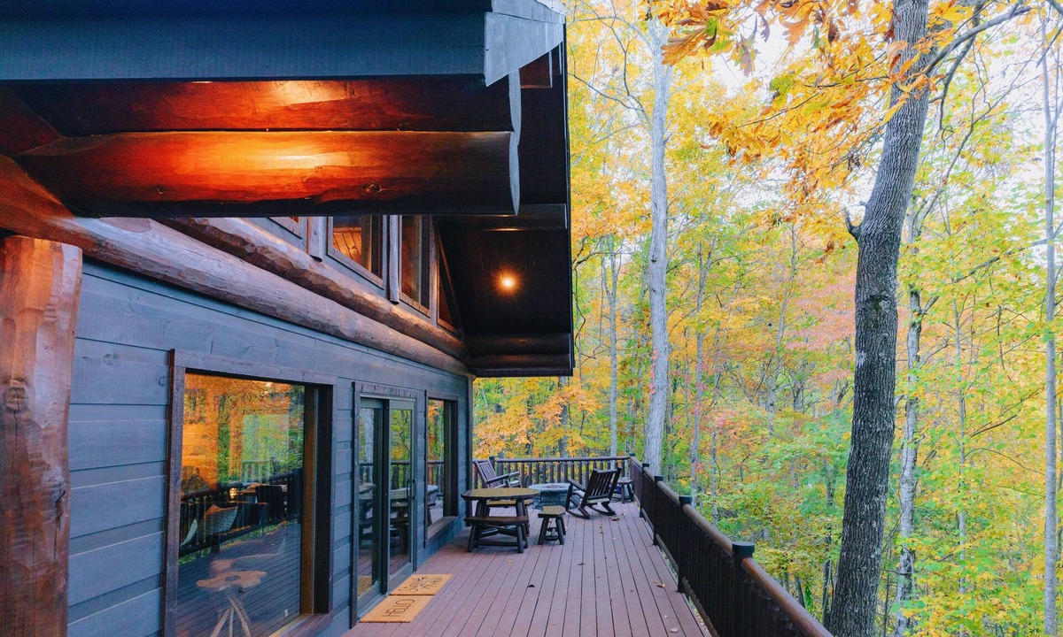Almond Cabin | Must-Know Perks: Private hot tub + relaxing soaking tub Luxurious king bed in a cozy, intimate space Peaceful wooded setting near the Smoky Mountains