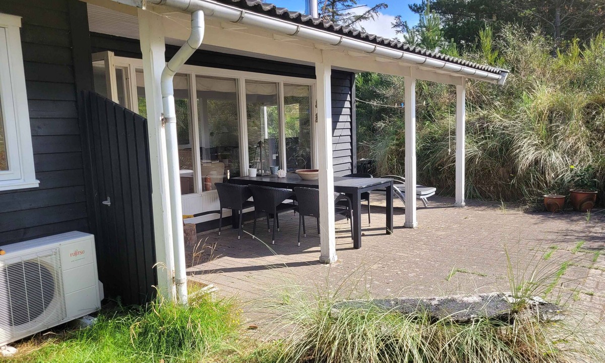 Klitmoller Cottage | Natural plot fireplace and true west coast