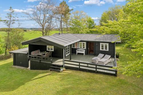 Ronbjerg House | Nature Holiday In Peaceful Log Cabin By Water