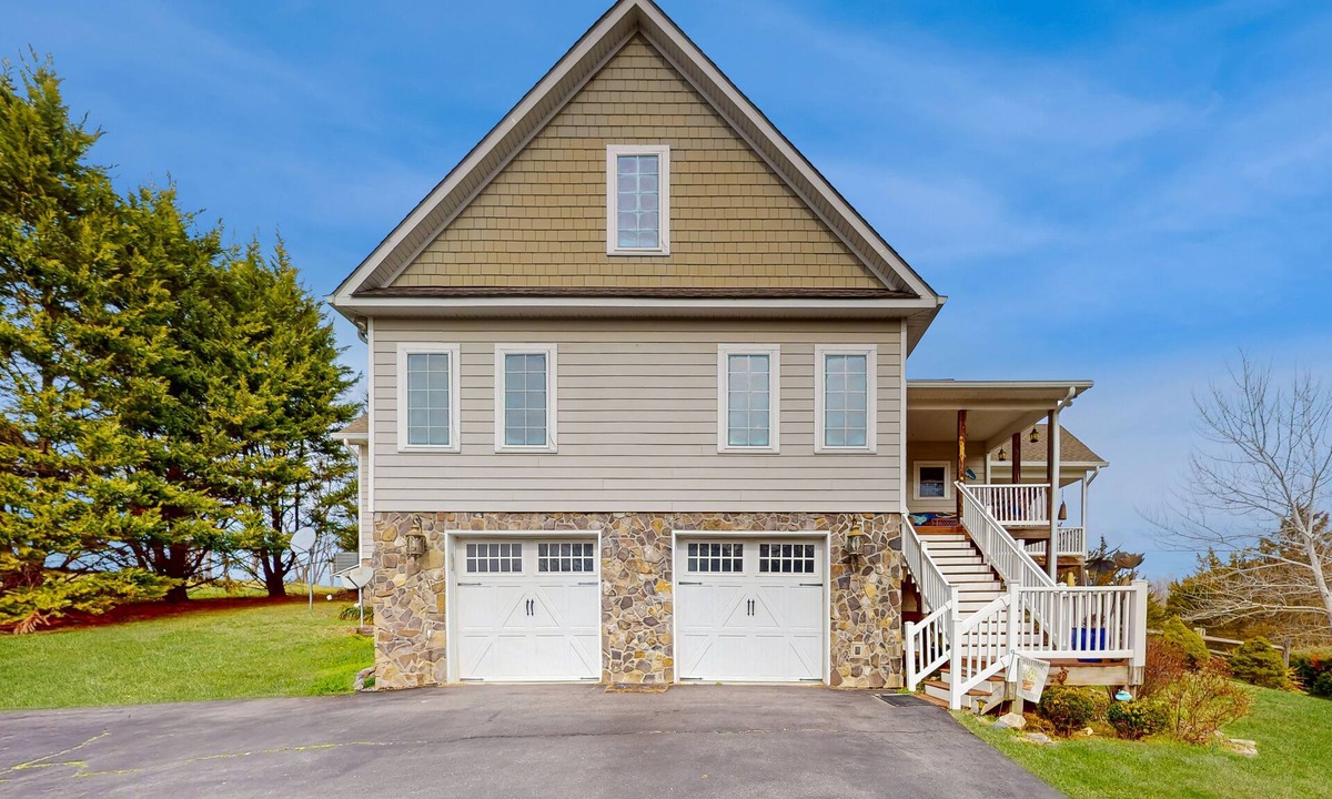Livingston House | Nature lover's lakefront home with a beach, dock, fire ring, & more