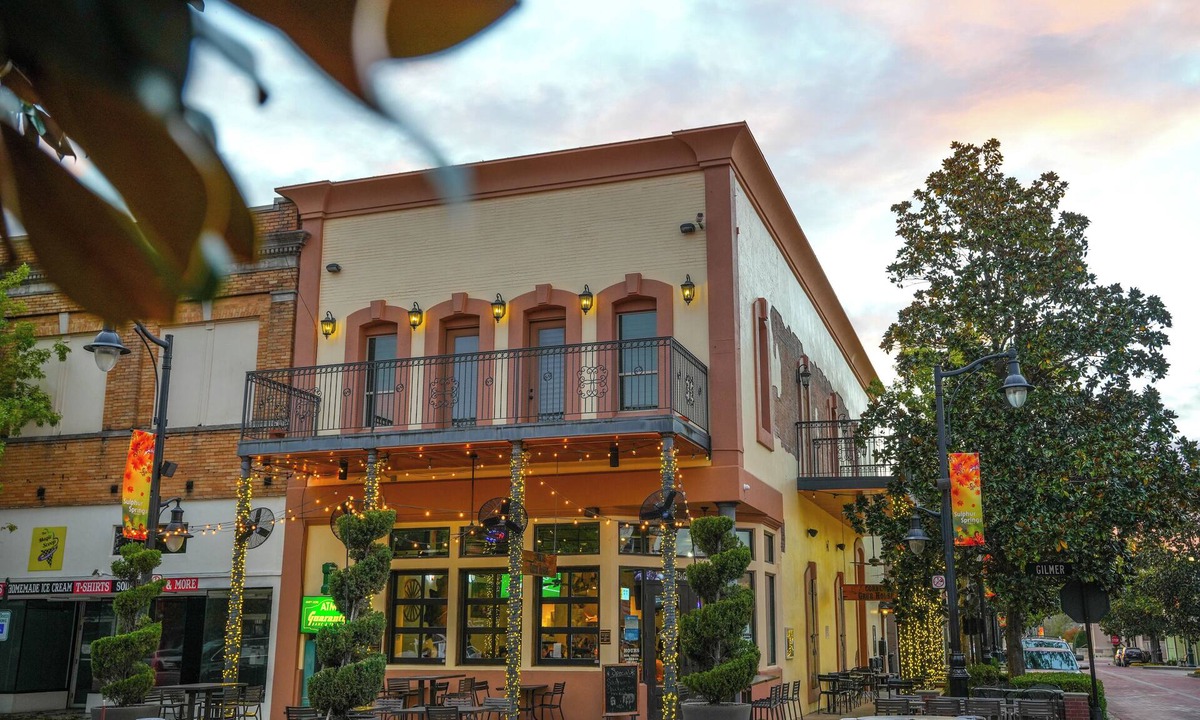 Sulphur Springs Apartment | Nestled in the buzzing heart of Sulphur Springs, White Oak Hotel isn't just a place to stay-it's an invitation to immerse yourself in a vibrant tapestry of creativity, flavor, and untamed beauty. Our intimate three-room retreat, born from historic bo
