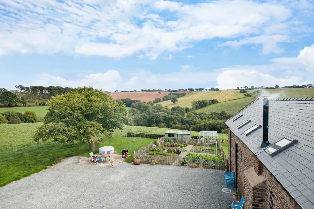 Little Cowarne House | NEW Barn Conversion. Idyllic and unspoiled views complete with Hot Tub and Fire