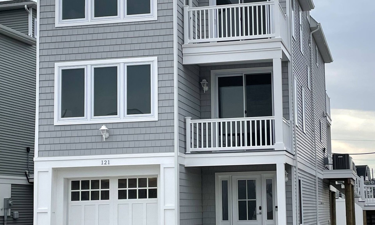 Normandy Beach House | New home with private beach and rooftop deck