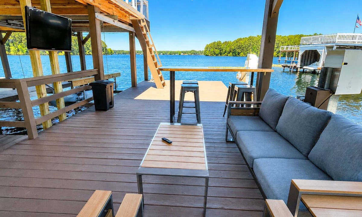 Littleton Cottage | NEW! Main lake Family-Friendly retreat with private dock, game room, & fire pit!