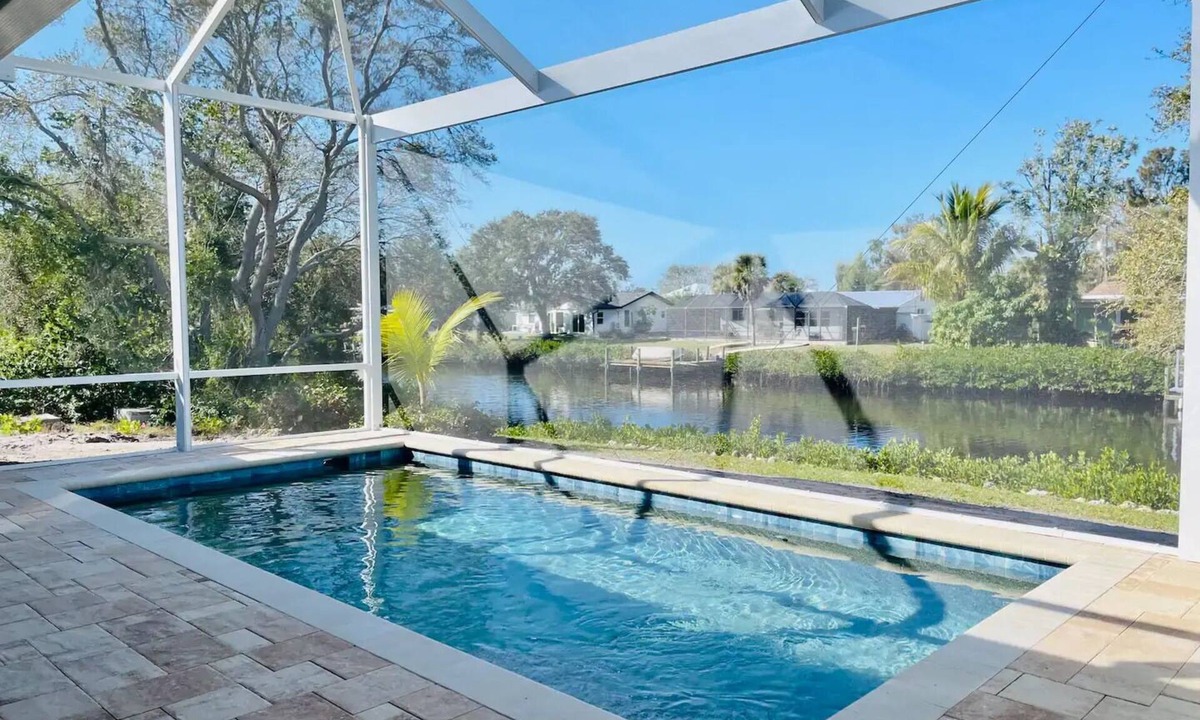 Nokomis Cottage | New Pool! - Tropical Waterfront Cottage -Dock & Optional Boat