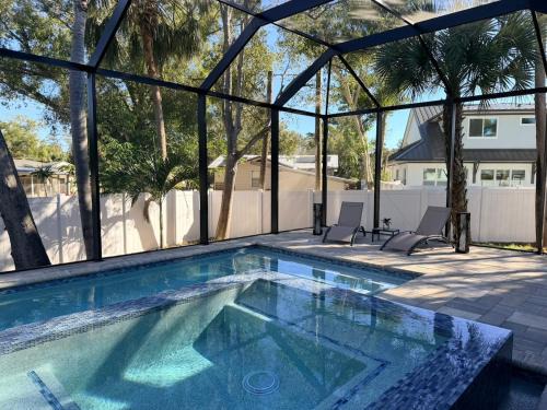 Downtown House | New Upscale & Modern Heated Pool Home in Walkable Downtown!