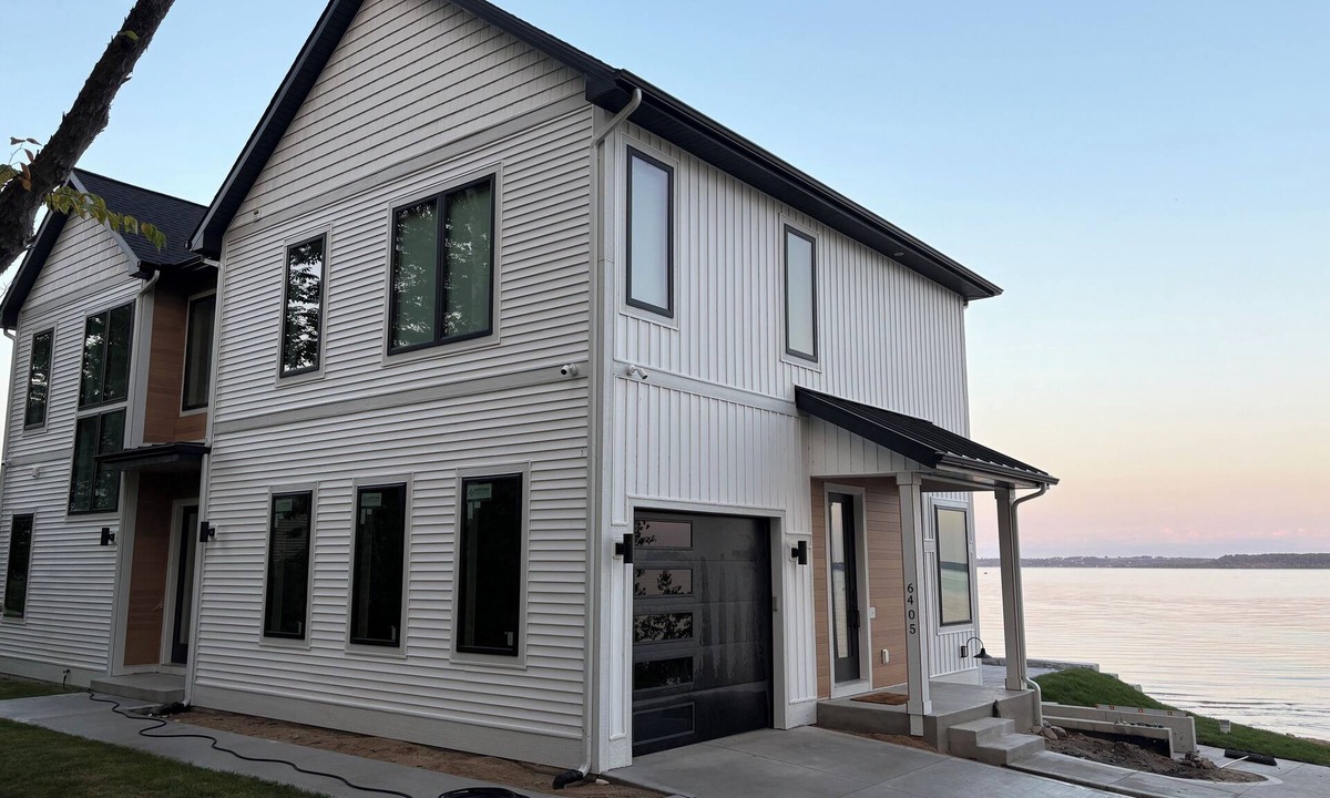 Suttons Bay House | New Waterfront Home with Private Beach