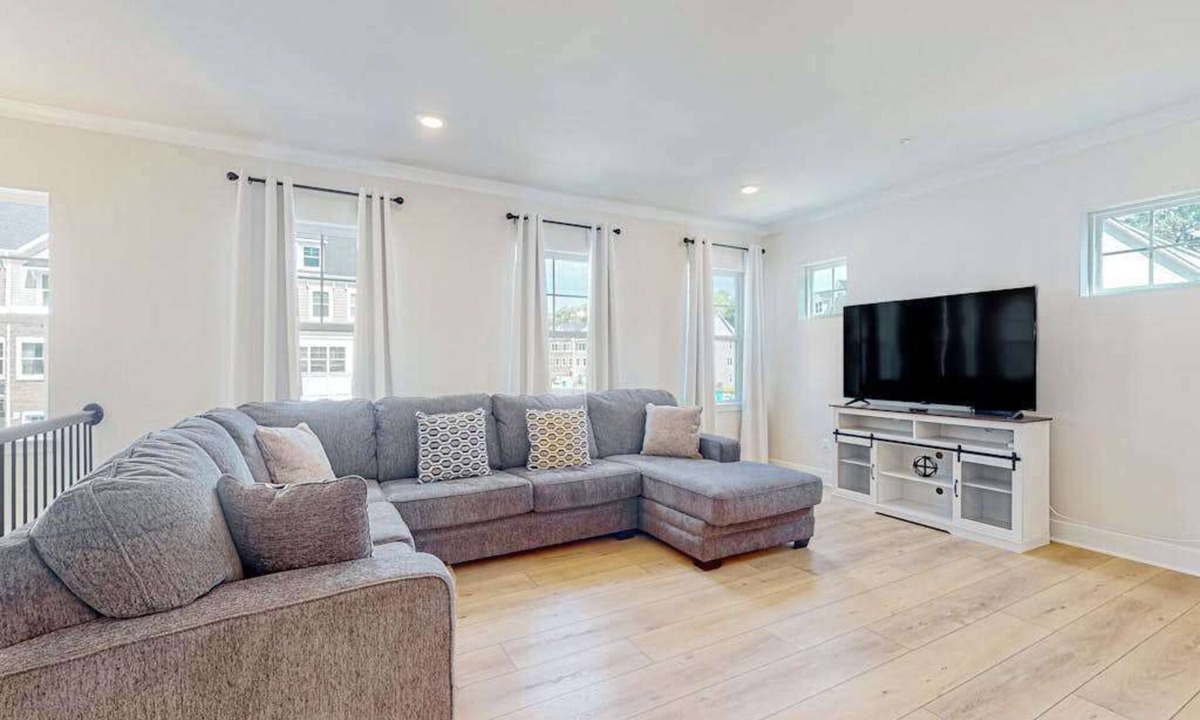 Ocean City Condo | Newly built row-end townhome with water view, pool access, patio, & balcony