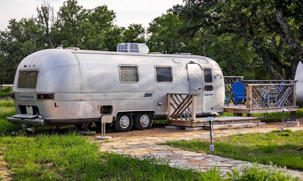 Spicewood House | Newly Renovated Camper with Fresh Decor and Tiny Deck in Texas
