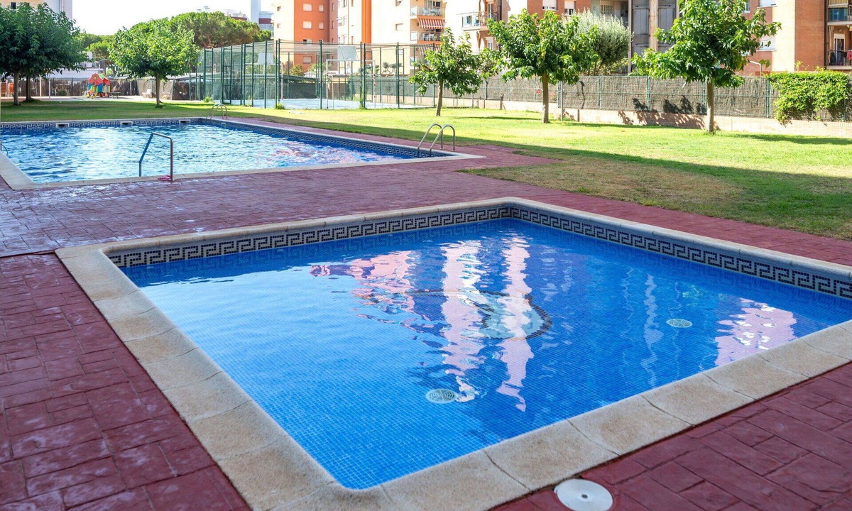 Malgrat de Mar Apartment | Nice apartment for 4 guests with A/C, pool, WIFI, TV and balcony