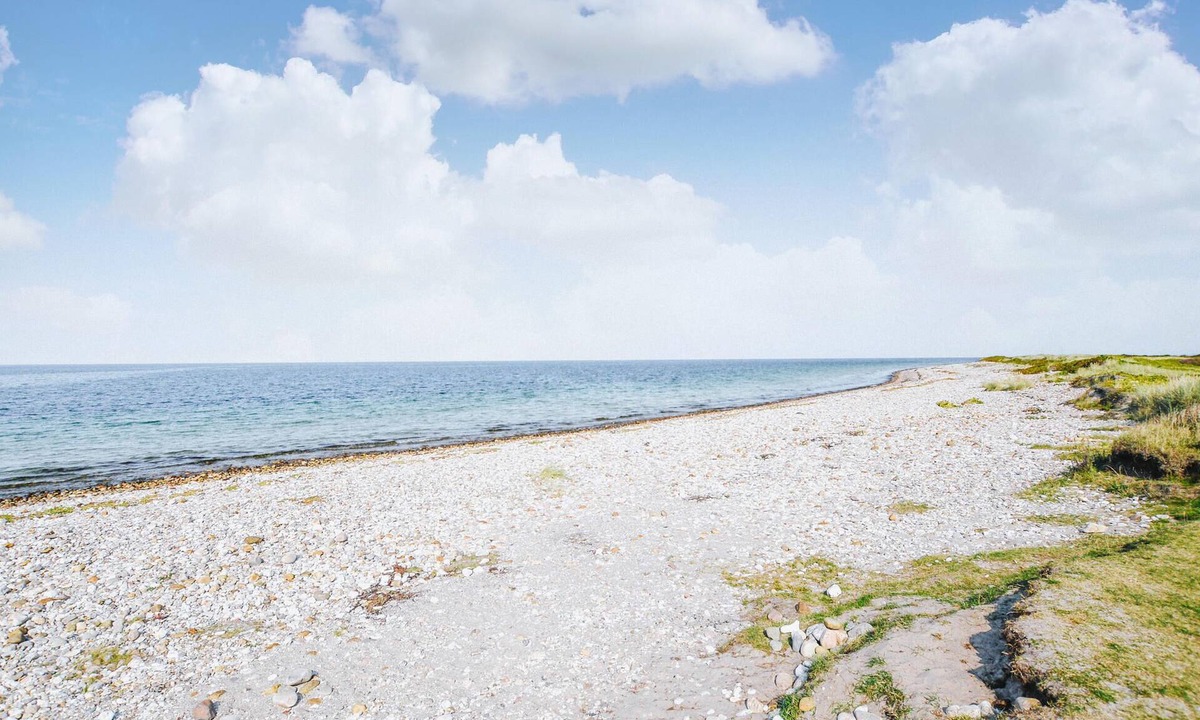 Rrvig House | Nice cottage with wood stove and idyllic garden, close to wonderful sandy beach.