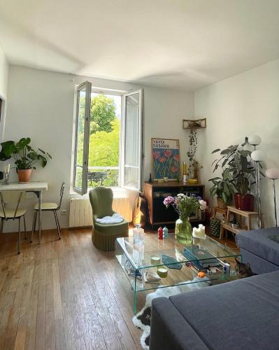 Amerique Apartment | Notre appartement vue sur les Buttes Chaumont