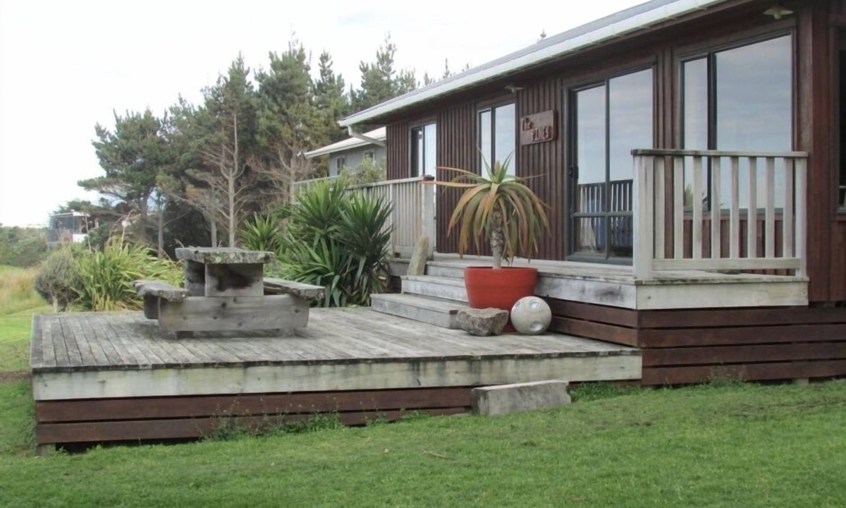 Mataikona House | Ocean-front beach house with warm outside shower.