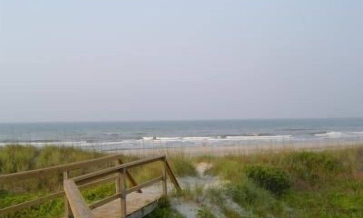 Morehead City Condo | Ocean-side condominium with pool. Fully-equipped for relaxed vacationing.