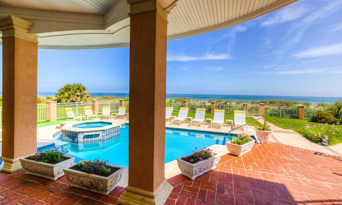 Golden Mile House | Oceanfront duplex with pool spa putting green walkway to beach