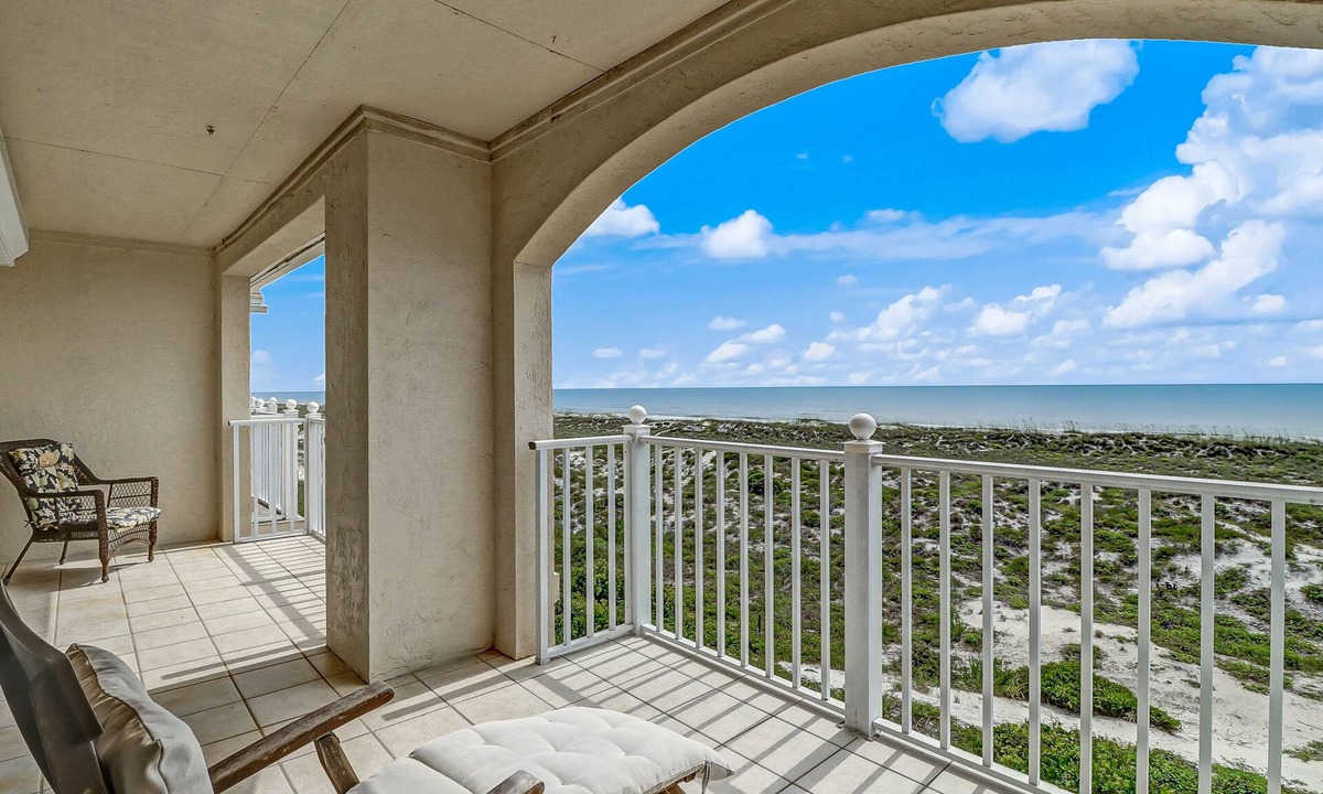 American Beach House | Oceanfront, gated community townhome with private W/D, beach & pool access