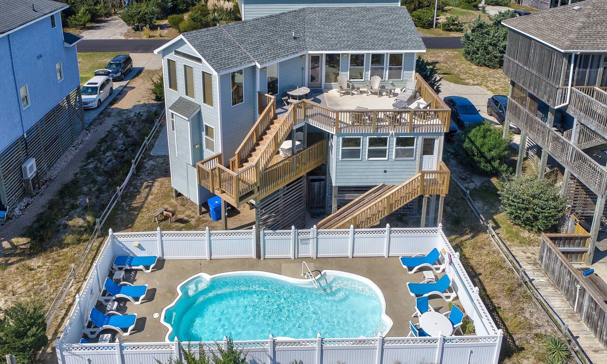 Waves House | Oceanfront home with private hot tub, outdoor pool, fireplace, & game room
