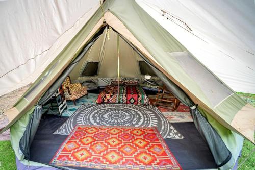 Cosby House | Off-Grid Creekside Tent Ideal for a Glamping Experience in Cosby, Tennessee
