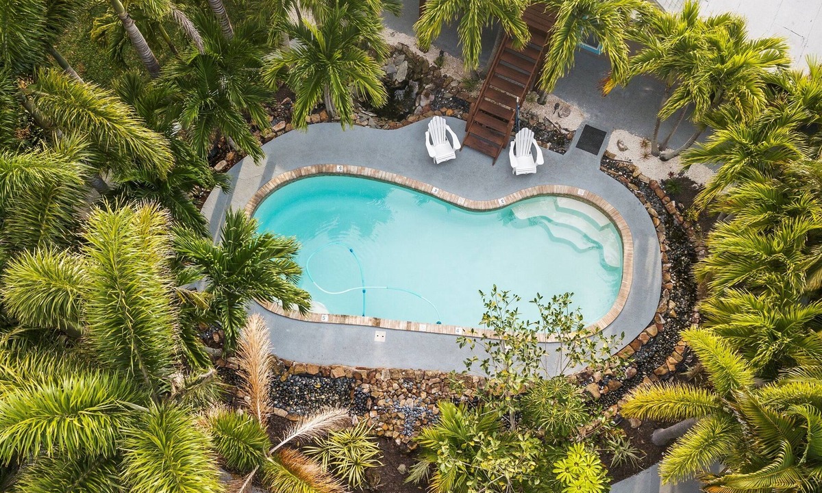 Whitney Beach House | Old Florida Pool Oasis, Outdoor Kitchen, Fire Pit, Pets Welcome