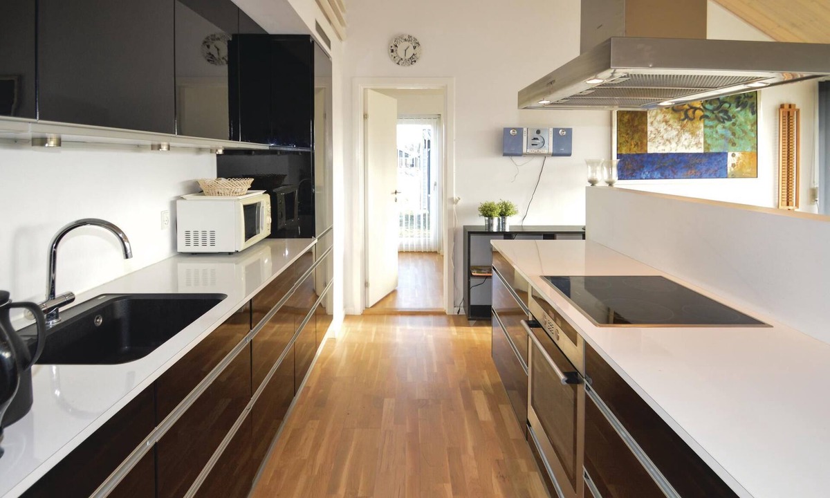 Tranum House | On a large natural plot in a newly parceled cottage area lies this luxury house.