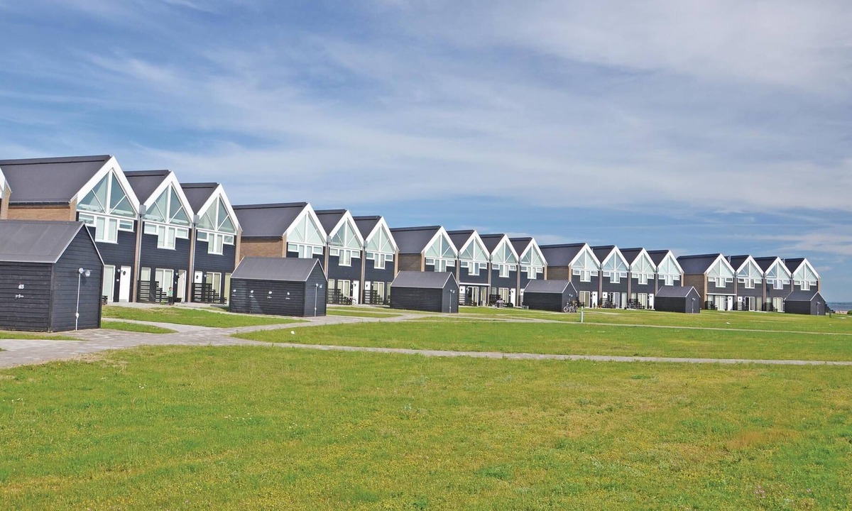 Assens House | On the naturally beautiful western Fyn, these lovely two-storey cottages are located directly facing