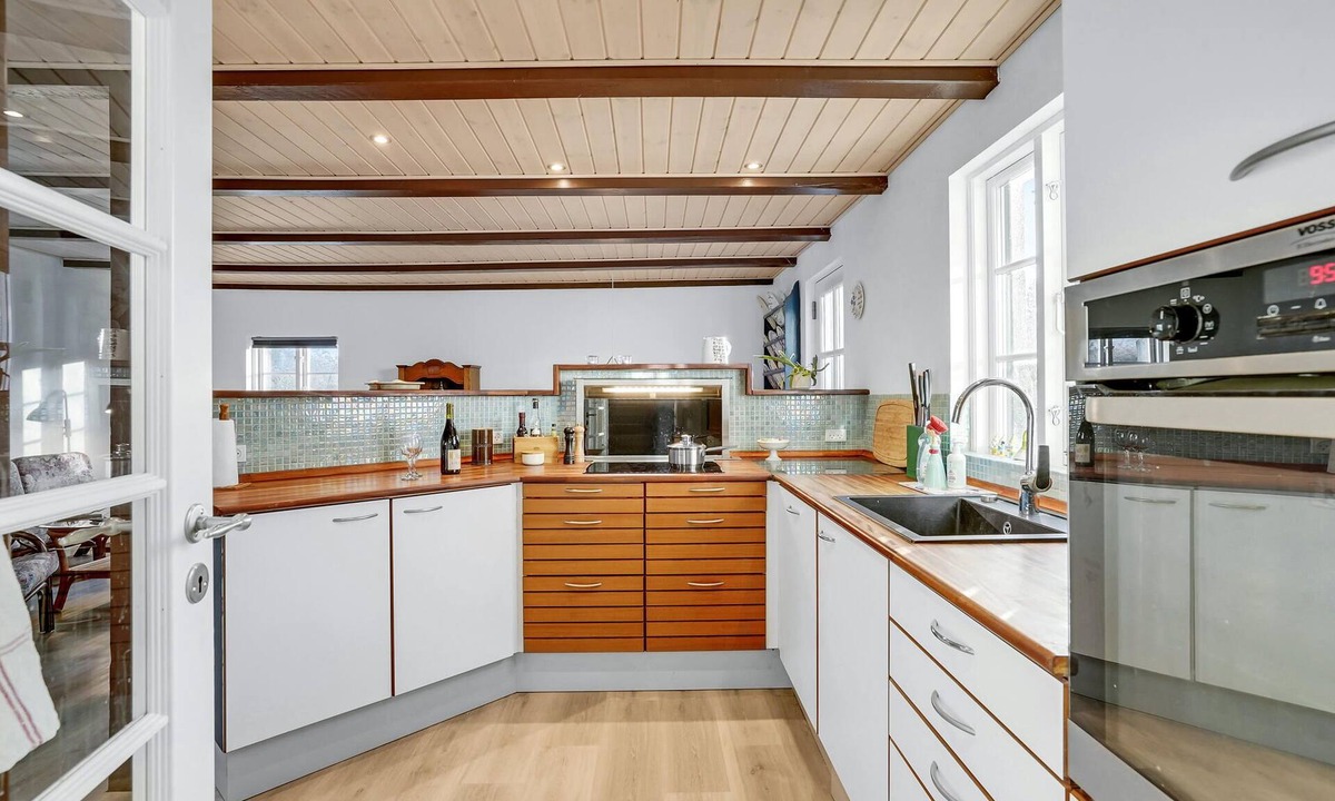 Maribo House | On the quiet island of Askø, this beautiful vacation home near the beach welcomes you.