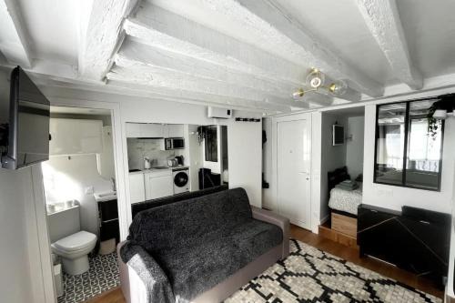 Chaussee-d'Antin Apartment | Opera 9th Rooftop Studio Full of Character managed by Mey Agency